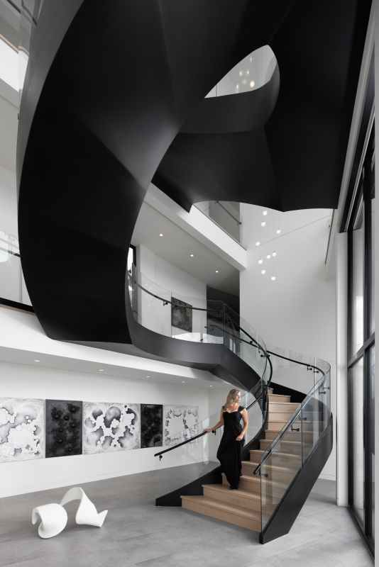 Mansion interior staircase with model