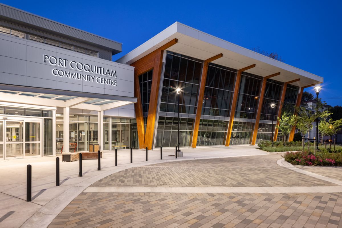 Commercial exterior at dusk of Port Coquitlam Community Centre
