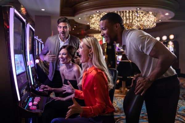 Hotel casino lifestyle hospitality of friends winning at slots