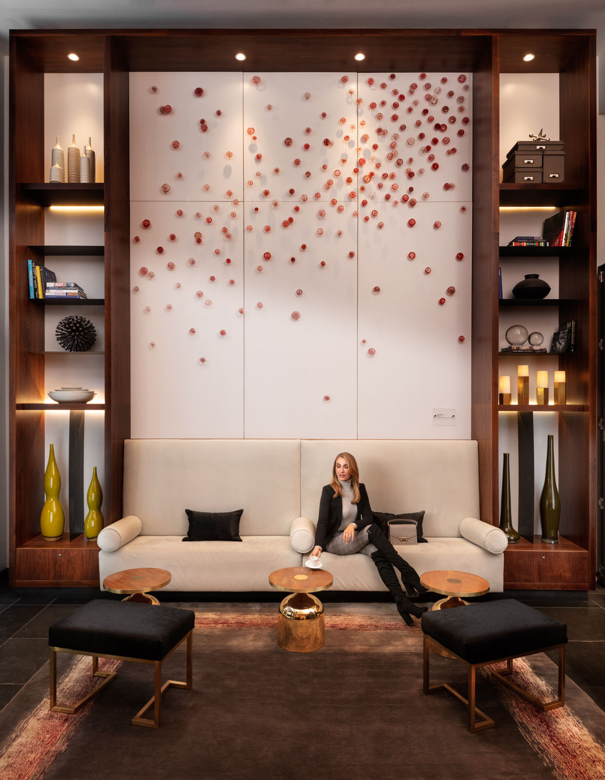 Hotel Cosmopolitan Toronto lobby interior lifestyle architecture with model having coffee